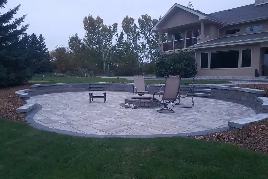 Custom built sunken patio with pillar wall